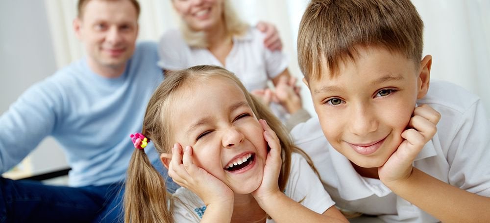 Smiling Family at Quality Heating & Air LLC